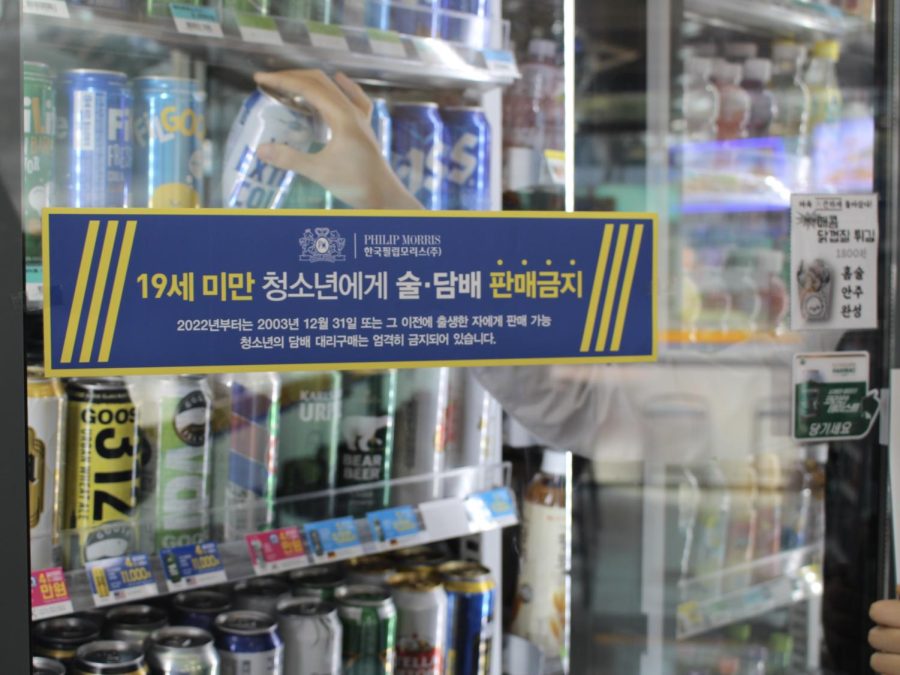 Students ignore reminders of the law, and buy beer with fake IDs. Photo by Jane Nam and Grace Chae. 