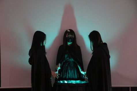 The three witches in Macbeth performing a prophecy. Photo by LIsa Seok.