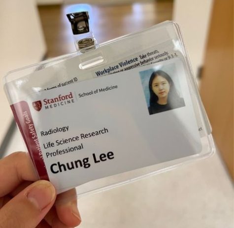 Sunny proudly shows off her ID card as a cancer researcher at Stanford. Photo provided by Sunny Lee.