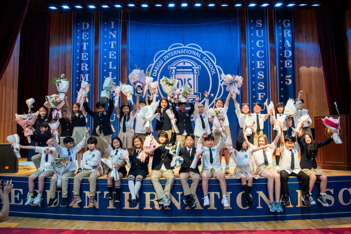5th+graders+gathered+in+the+Jetnasium+on+June+13th+to+celebrate+the+end+of+their+elementary+years.+After+speeches+made+by+the+admin+and+the+homeroom+teachers%2C+Ms.+Morissette+and+Ms.+Son%2C+students+walked+up+to+the+stage+for+their+diplomas.+Friends+and+families+celebrated+the+efforts+elementary+schoolers+put+in+during+the+5+years+of+education%2C+and+graduates+prepared+for+a+step+up+to+middle+school.%C2%A0