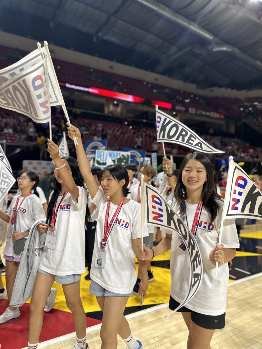 Jets marched through the gym as NHD introduced participants from Korea. Photo by Ms. Katie Kim.