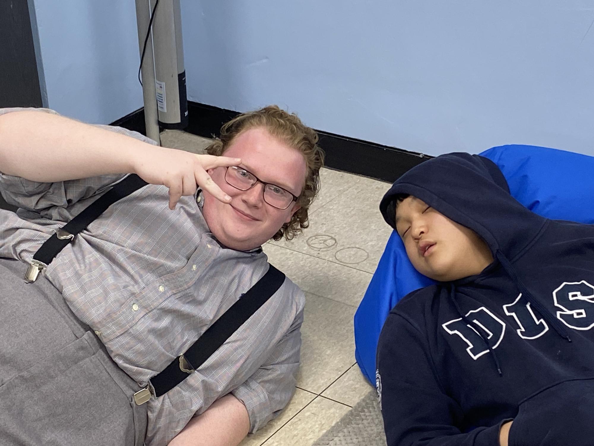 Mr. Mayo lies down next to Justin Son from ninth grade, who hit snooze before Learning Lab. Mr. Mayo surprises Justin to wake him up. Photo courtesy of Mr. Mayo.