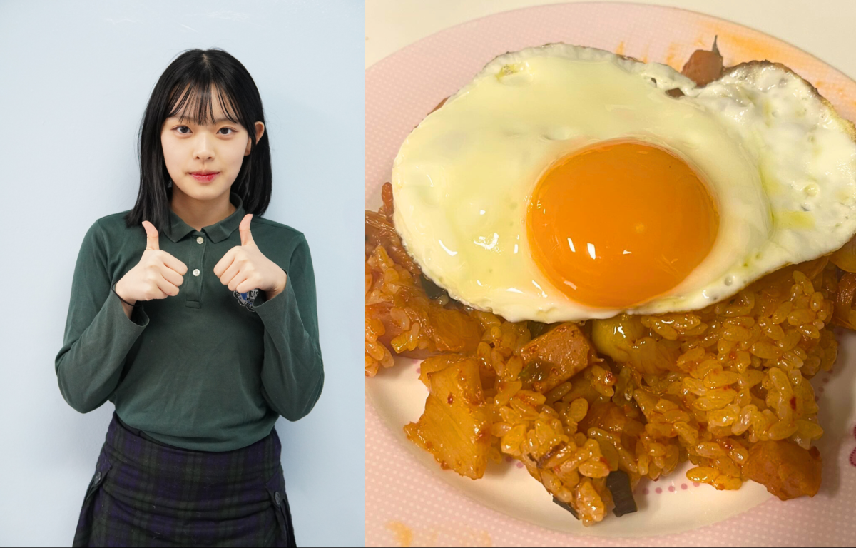 A sunny-side-up crowns a bed of kimchi fried rice filled with fiery flavor and home-style comfort. Hailey, a fledgling chef, cooked a medley of tangy kimchi and ham flavors spontaneously due to her parent's sudden absence, bringing warmth and cultural flair to every forkful. 