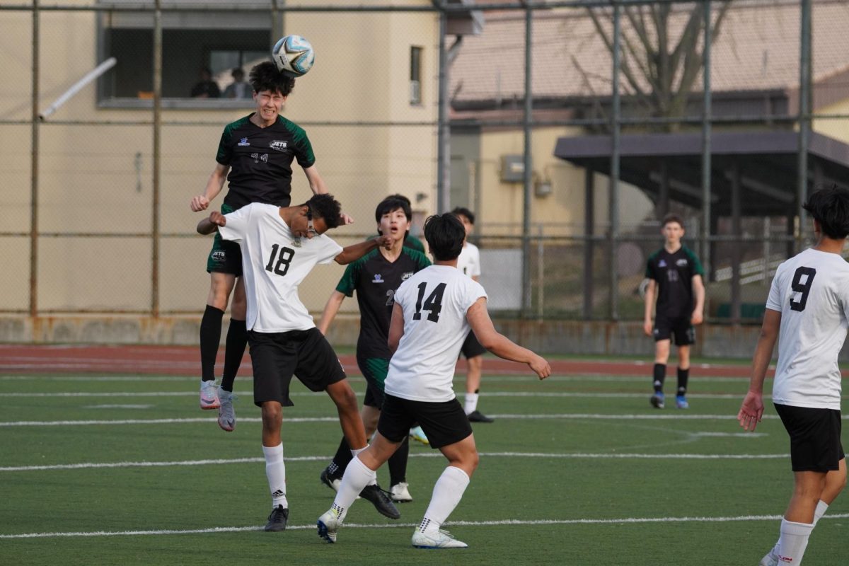 Striker Ethan Rossmeisl leaps above the 6 footer to win the header. His unrivaled vertical gives him the ability to out-jump opposing players.