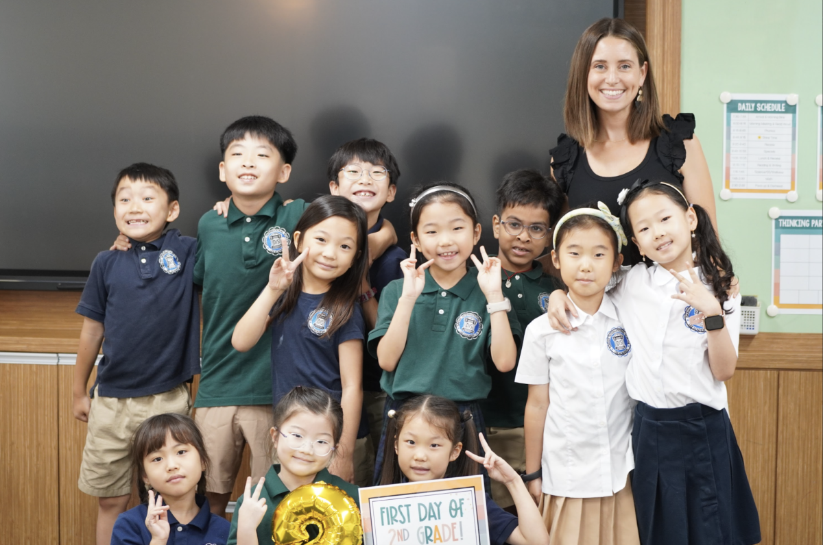 The second-graders enter their third-ever first day of school. Mrs. Kaschub melts their nerves with her signature warm smile. 