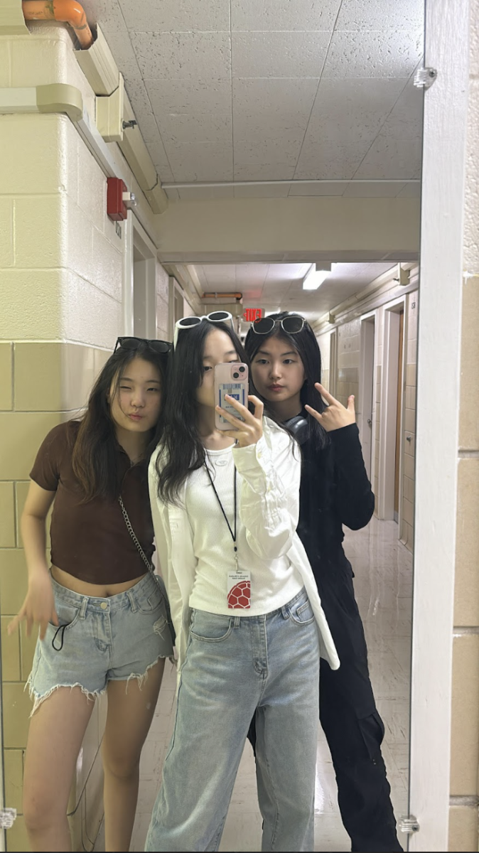 Eighth-graders Minji Kim, Elena Lee, and Sally Yun celebrate "the best performance of their lives." Although they did not advance to the finals, they ended their middle school journey with a bang in Washington D.C. 