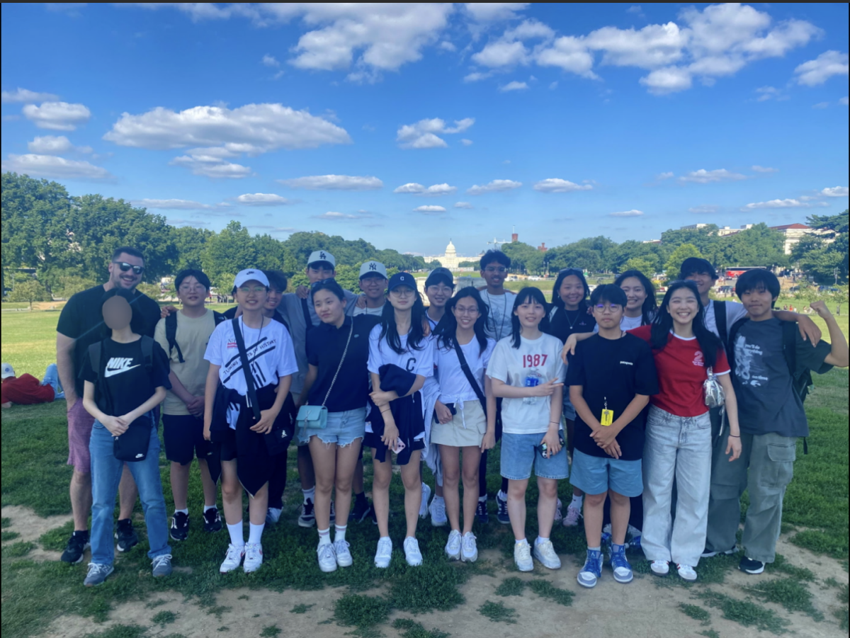 Jets historians and Mr. Kaschub gather for one last group photo before the closing ceremony. The finalists smile nervously as they await their results. Photo courtsey by Ms. Spaeth.