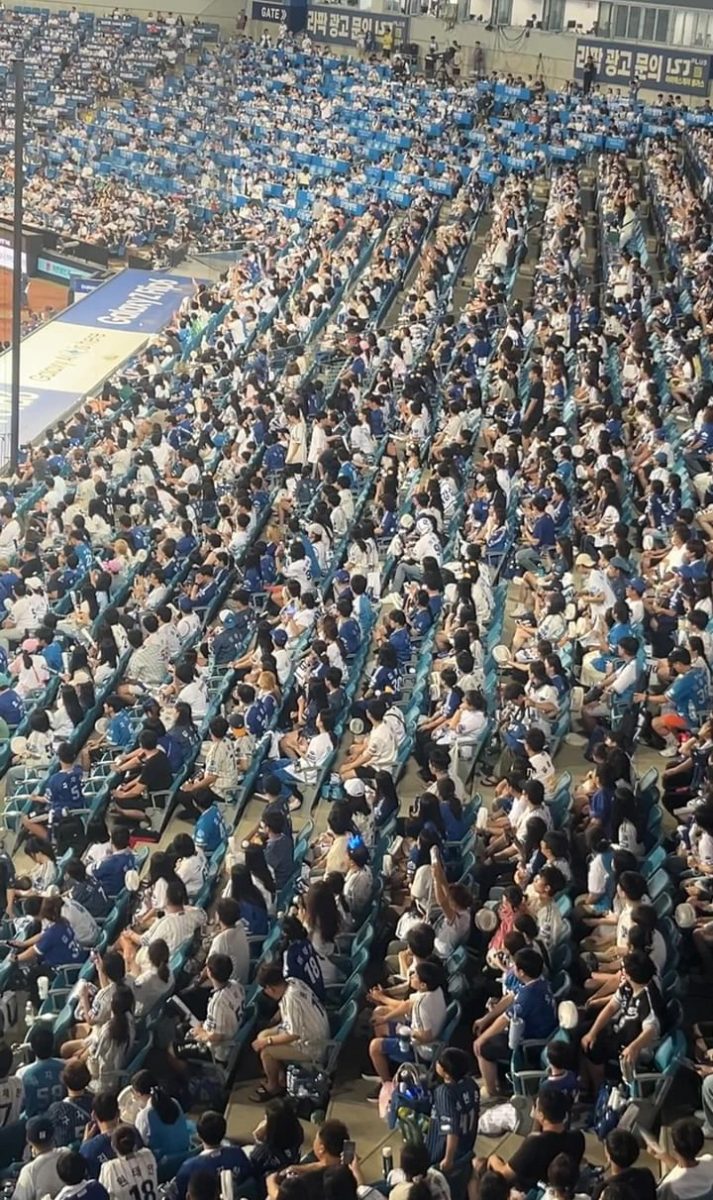 Diverse fans across all ages and genders pack the Samsung Lions Park. Although some fanatics lug the team down, families and friends energize K-baseball culture. 