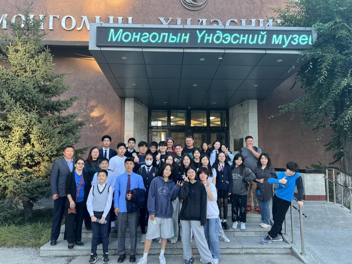 DIS students and their new friends from school #87 celebrate after touring the National Museum of Mongolia. They grew closer after a day of relay games.  Photo used with the permission of Rustic Pathways. 