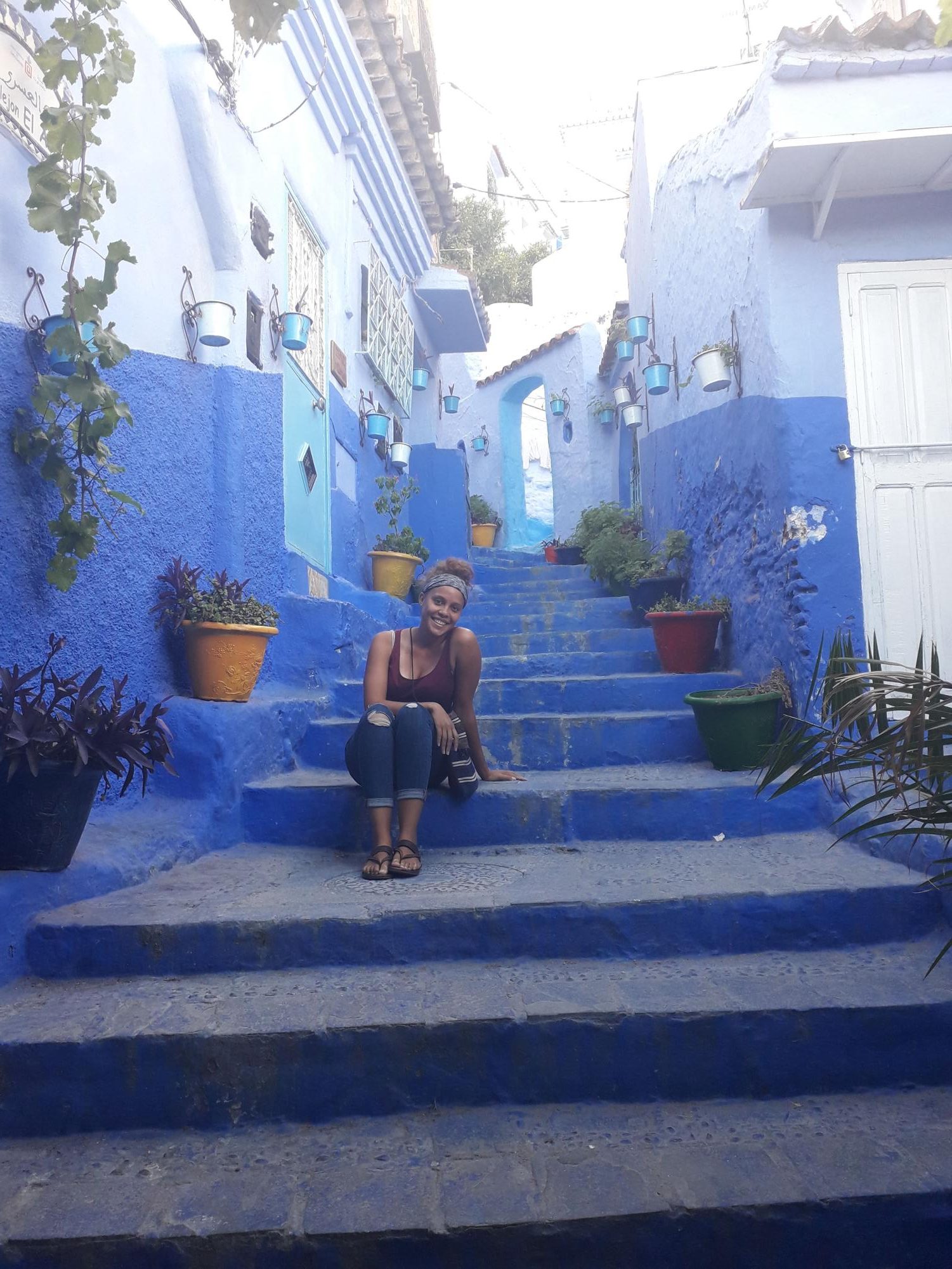 In the rich sapphire towns of Chefchaouen, Morocco, Ms. Dennard immerses herself in the colorful atmosphere. Photo courtesy of Ms. Dennard. 
