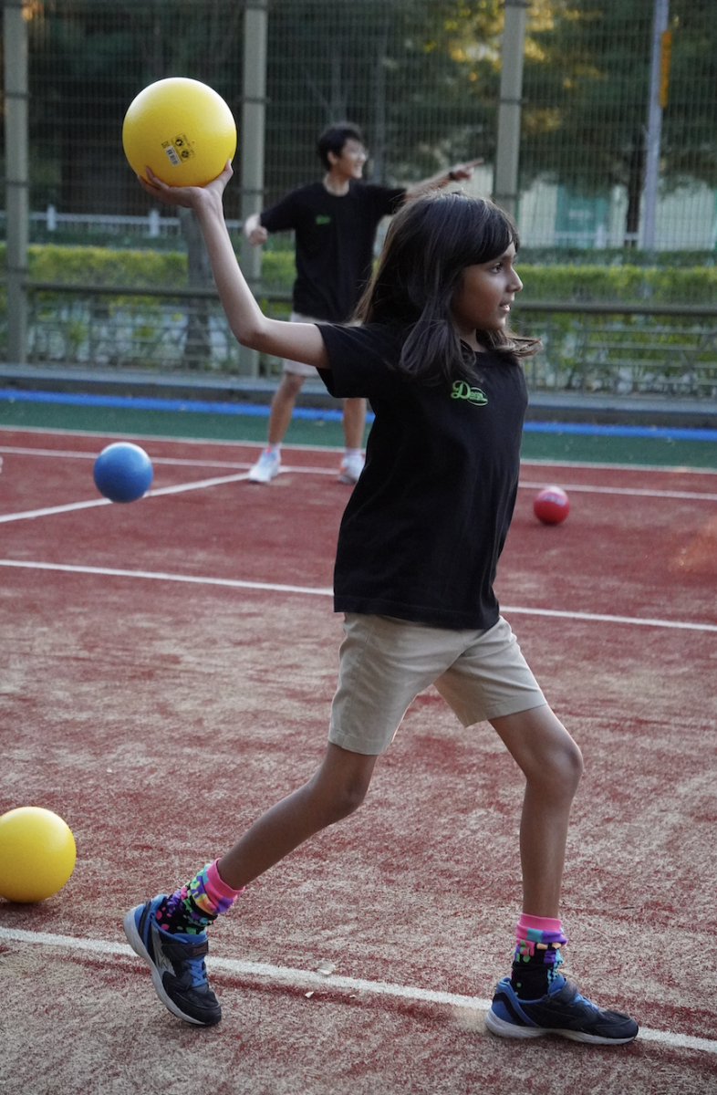 Tanu Banerjee in fourth grade zeroes in on her friend. She aims to strike her friend out to claim the win. 