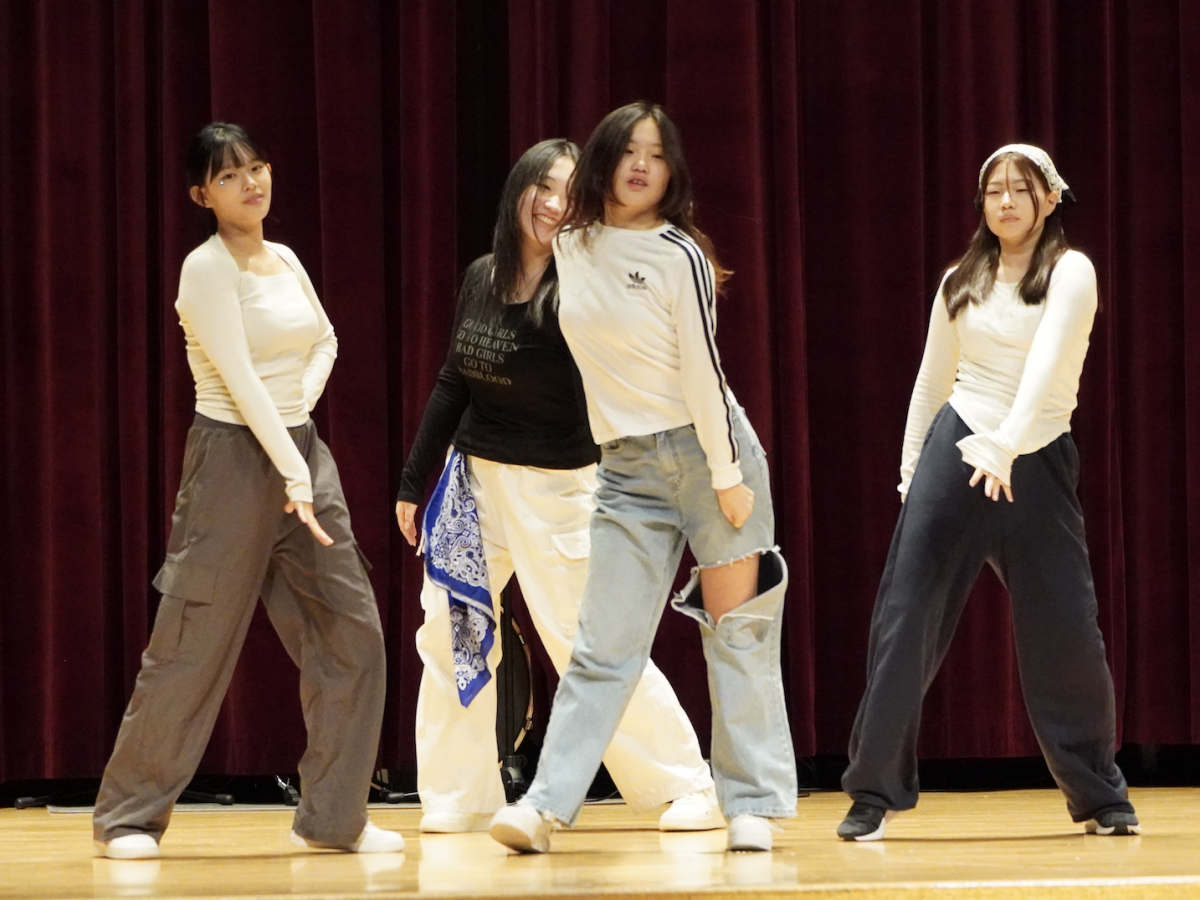 Freshman Minji Kim steals the show with her powerful dance moves. Senior Hailey Tzou, sophomore Beatrice Lee, and sophomore Reina Li support Kim’s debut performance.