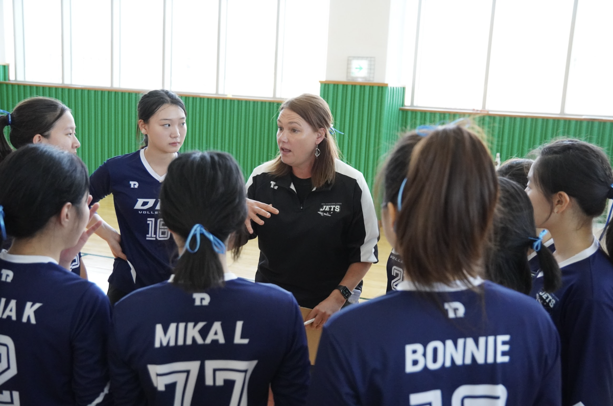 Mrs. Jolly motivates the team post-game, celebrating their victory against FPS. At the same time, she emphasizes the importance of teamwork and resilience.