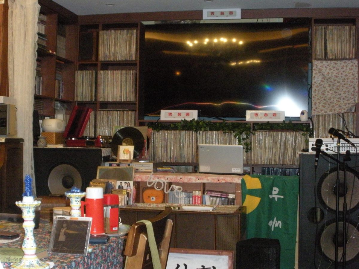 Countless LPs and albums spill out of Treasure Island dabang’s shelves. Old music blares out of the speakers. 