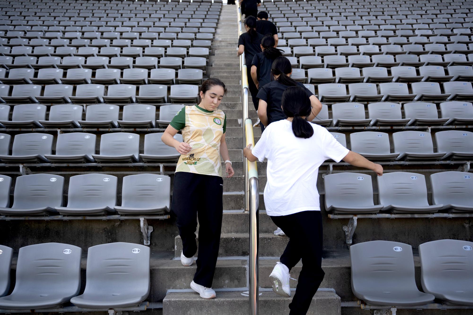 Rivera jogs up and down the stairs of the Ulsan Moonsu Football Stadium. Two flights behind, the rest of the group treks along as they struggle to keep pace with the leading pack.
