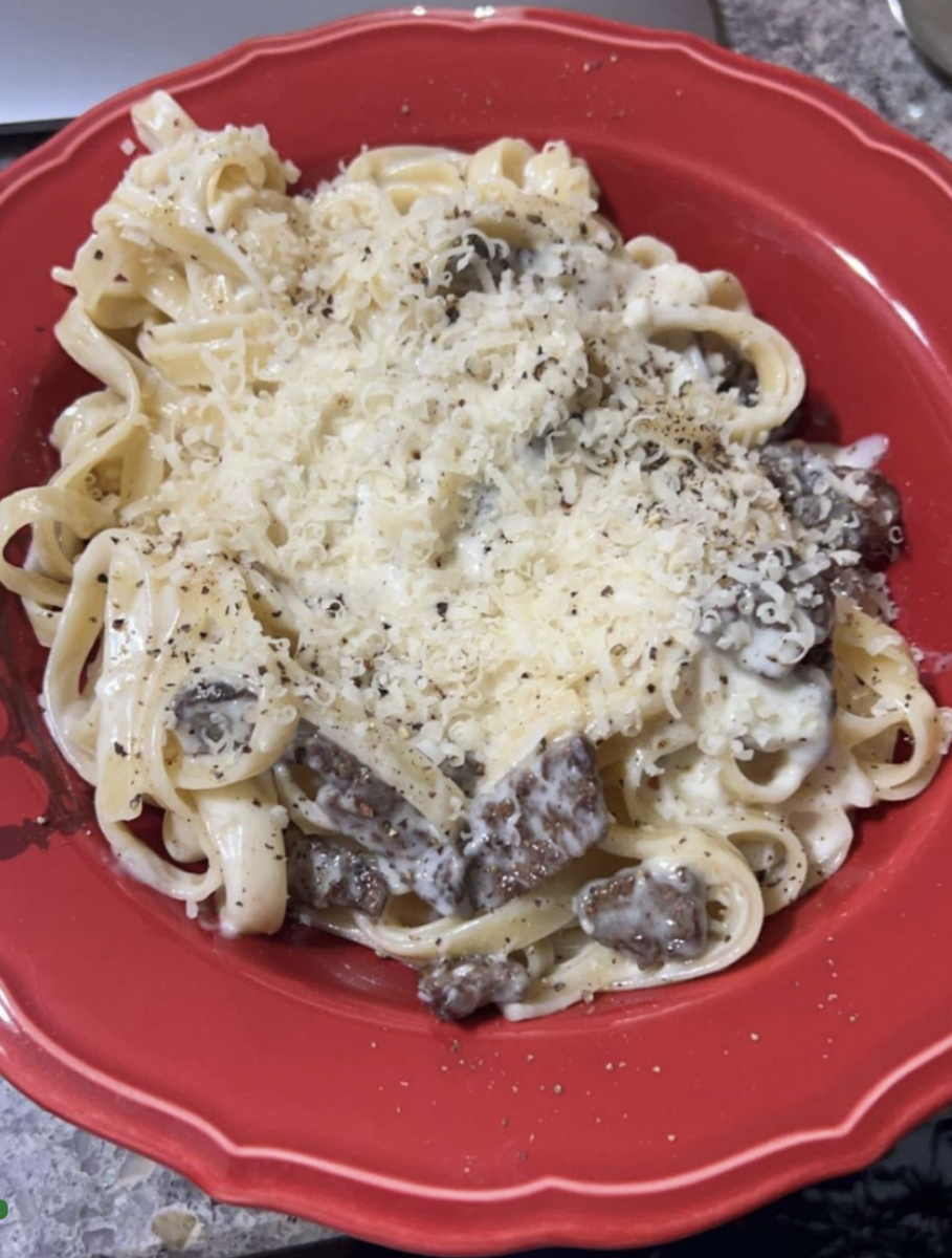 The smooth and velvety sauce clings to the perfectly wide fettuccine noodles.