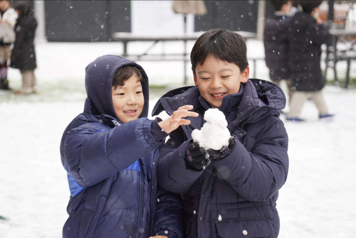 "Do you want to build a snowman?" First graders Paul Lee and Leo Biern fulfill Frozen Anna's wish with one of their own. 