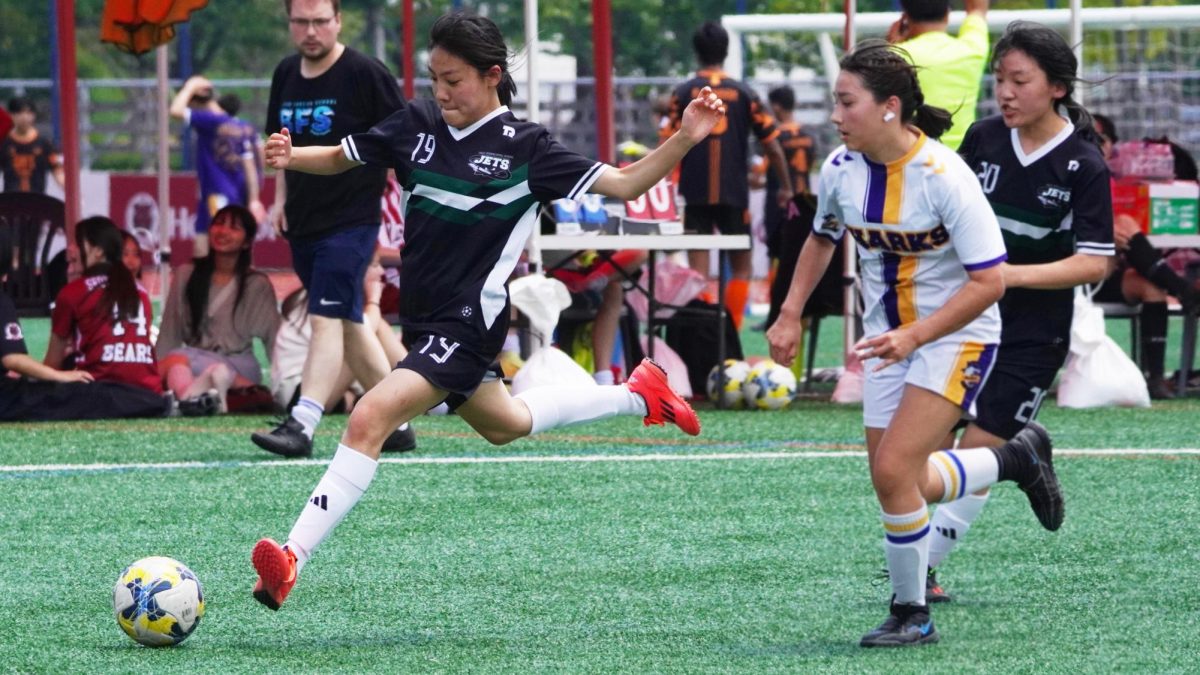 Freshman forward Sarah Cho (19) winds up for a powerful strike, unleashing a cannon-like shot toward the bottom corner. She buries it past the keeper, netting a crucial goal for the Jets.