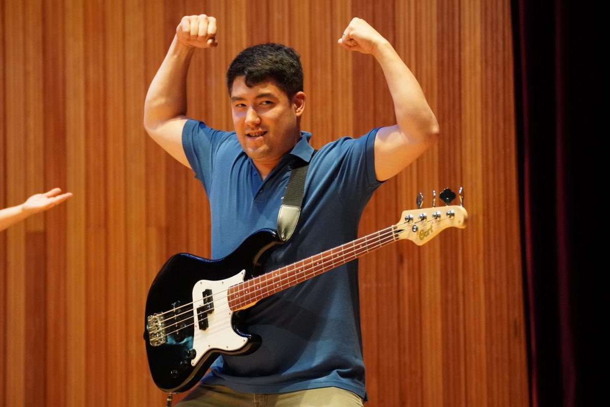 Rock band adviser Mr. Hutchings joins Kebab Party in place of absent bassist Luke Cho in ninth grade. Although he has never performed with the band before, he supports the band with the low notes.