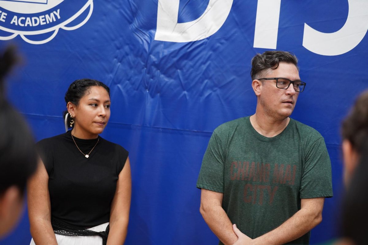 Head Coach Willette and Assistant Coach Marchan observe the players hit and receive. Despite joining forces for the first time, they put their heads together to create new training methods for the athletes. 