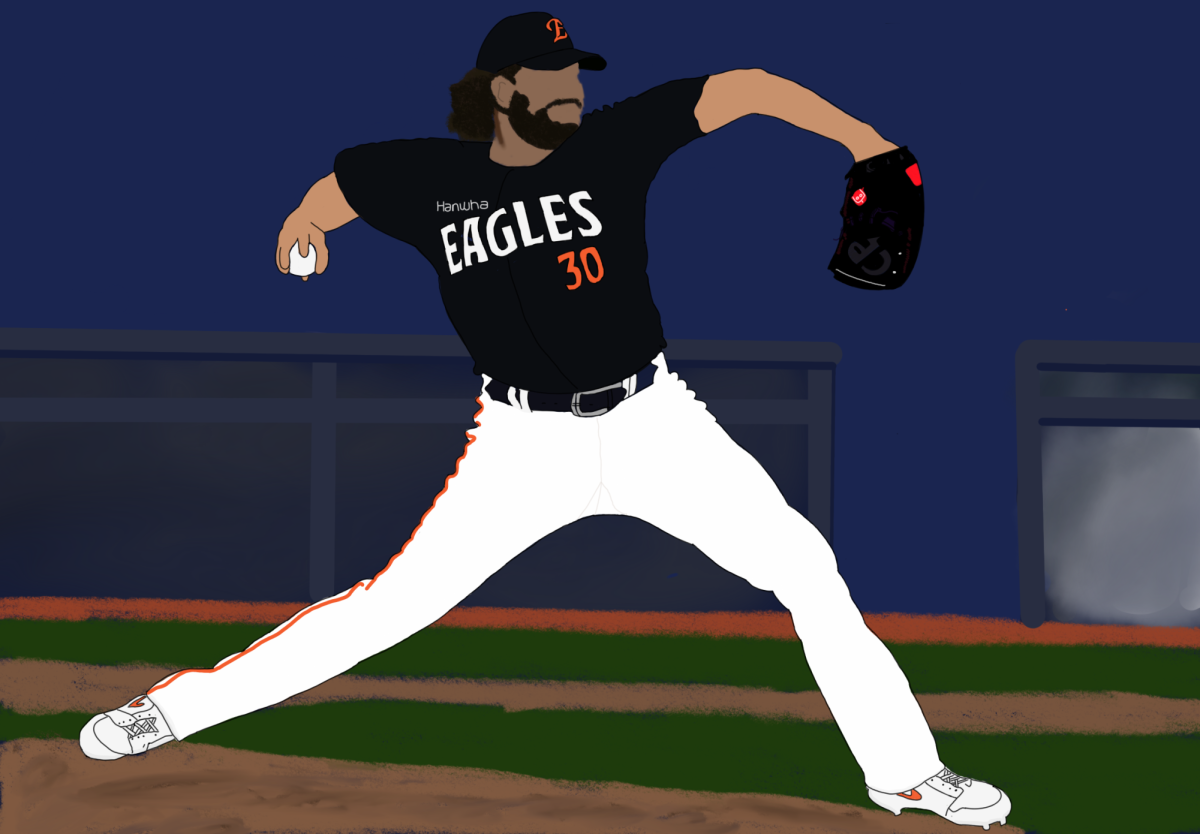 Hanwha Eagles pitcher Cody Ponce begins his wind–up, preparing to unleash the ball in a match-up against the Kiwoom Heroes.