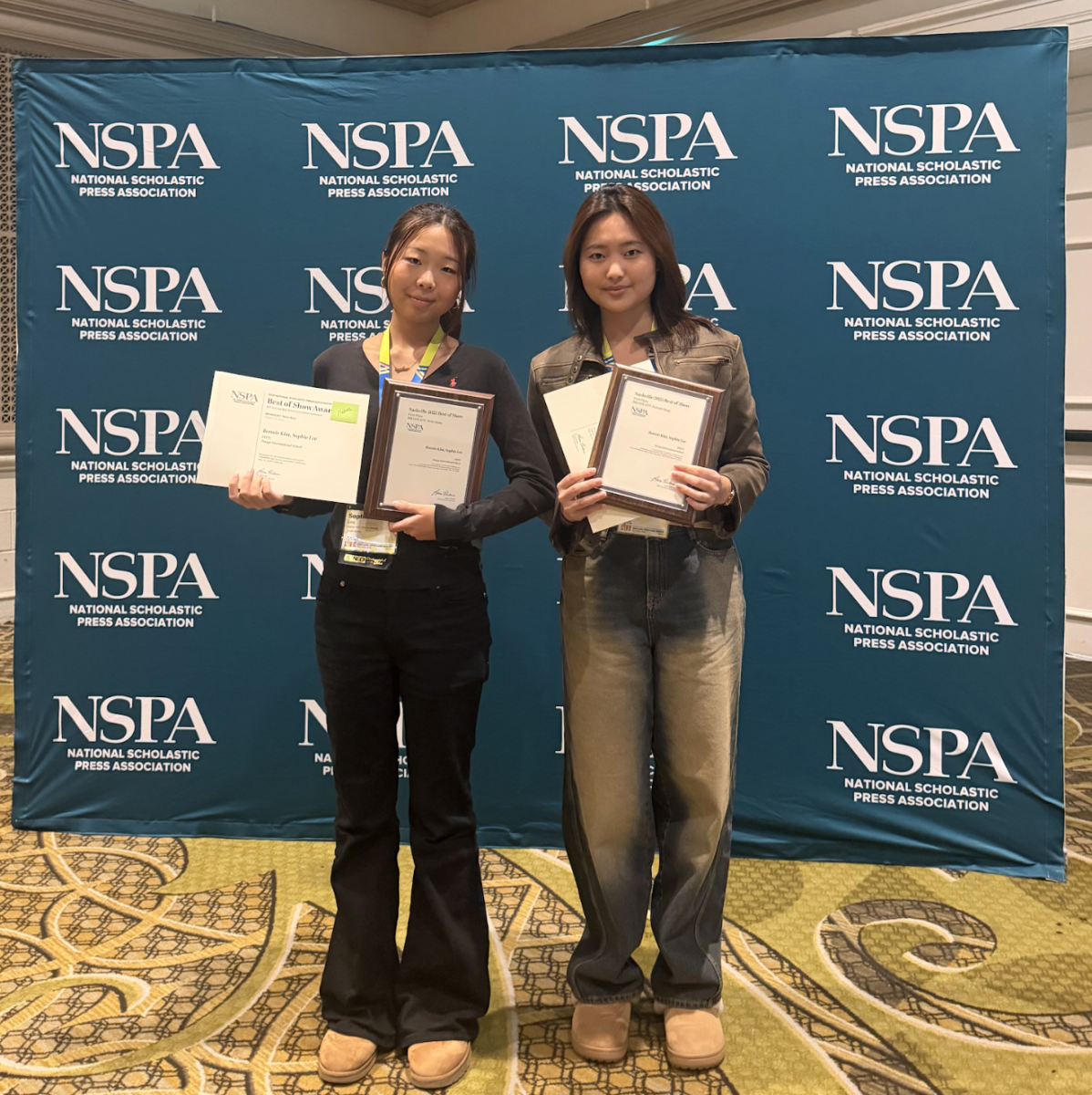 Juniors Bonnie Kim and Sophie Lee celebrate their two-peat Best of Show triumph. Their win also marks the publication’s first-ever multimedia award.