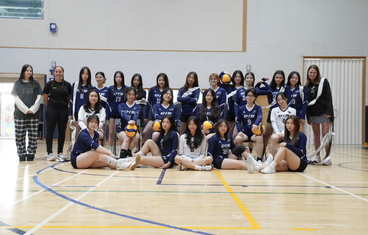 The JV and varsity teams gather alongside Coach Jolly and manager Olya Karpenko to celebrate their strongest season to date. United by grit and growth, the program capped the year with a full podium sweep, bringing home gold, silver and bronze across competitions.