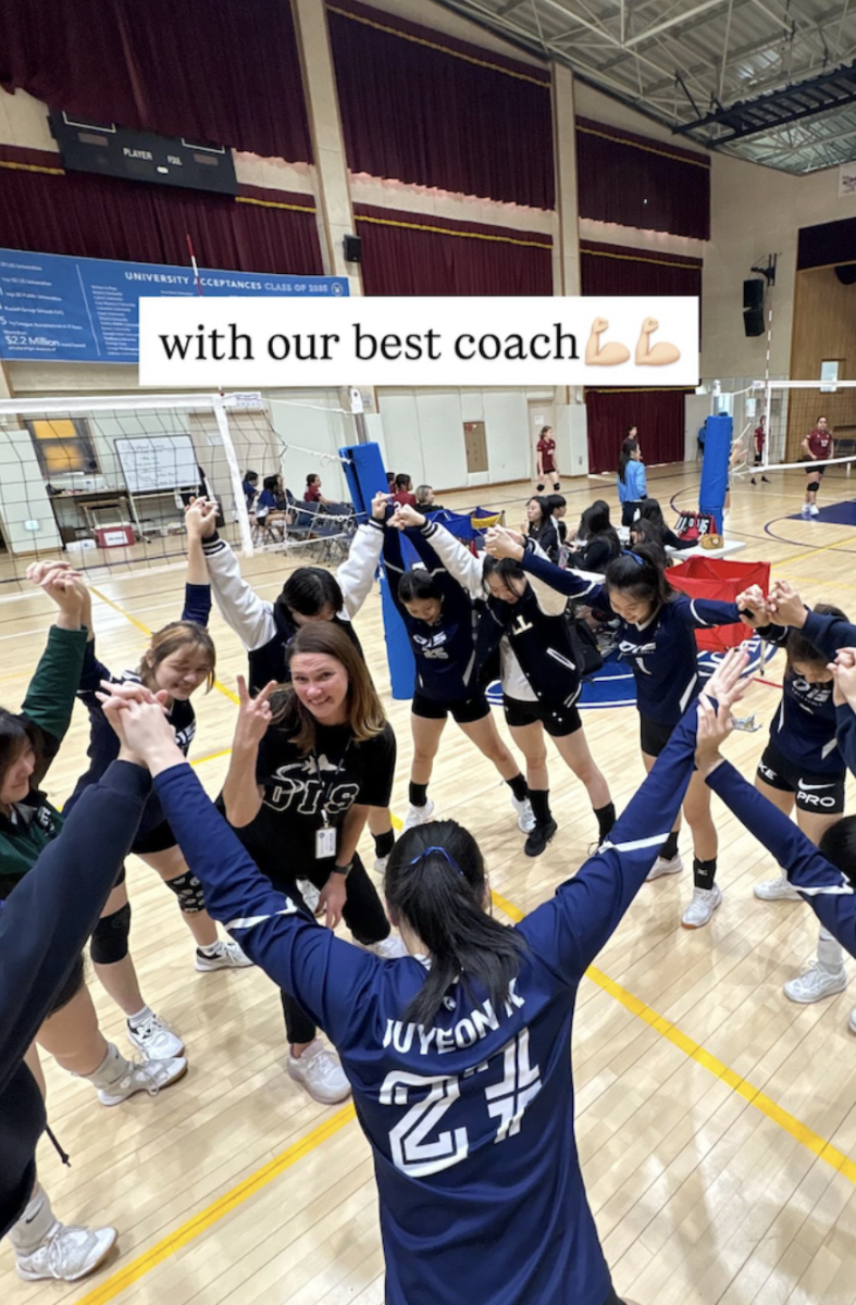 The varsity team come together after their match at SKAIS, closing the game as a unified circle. The huddle reflects the team’s appreciation for the guidance and dedication Coach Jolly poured into the program throughout the season.
