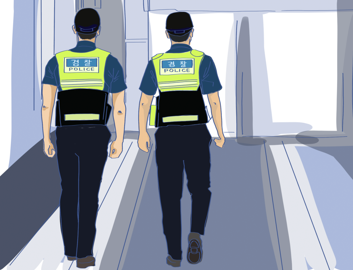 Auxiliary police officers walk through the streets of Korea, ready to protect citizens. Senses alert, their training prepares them to face the rising crime rates.