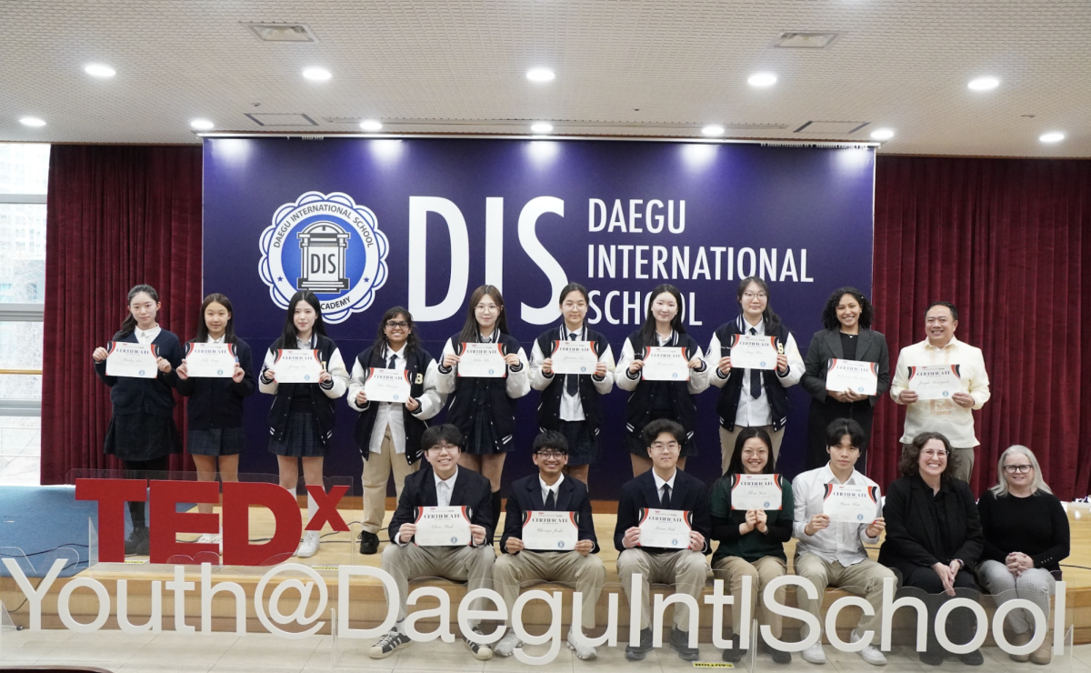 The TEDx crew and orators celebrate as the candle blow marks the finale. The 2026 TEDx Youth event sets a new benchmark, sending attendees out of the presentation hall with renewed curiosity and ambitious goals.