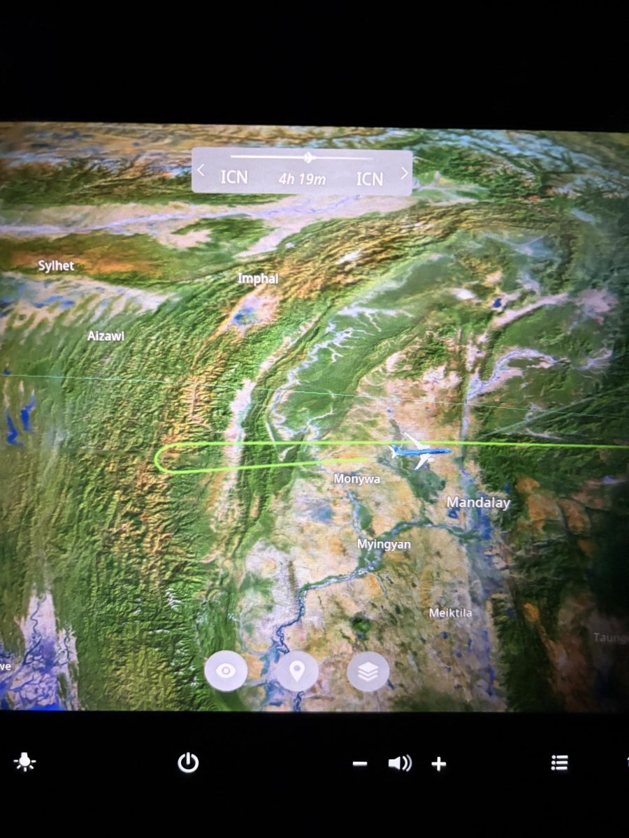 The aircraft KE952 of Korea Airlines makes a U-turn back toward Incheon above Myanmar. With confusion and anxiety, the passengers on the plane bring out their phones to look up live updates.